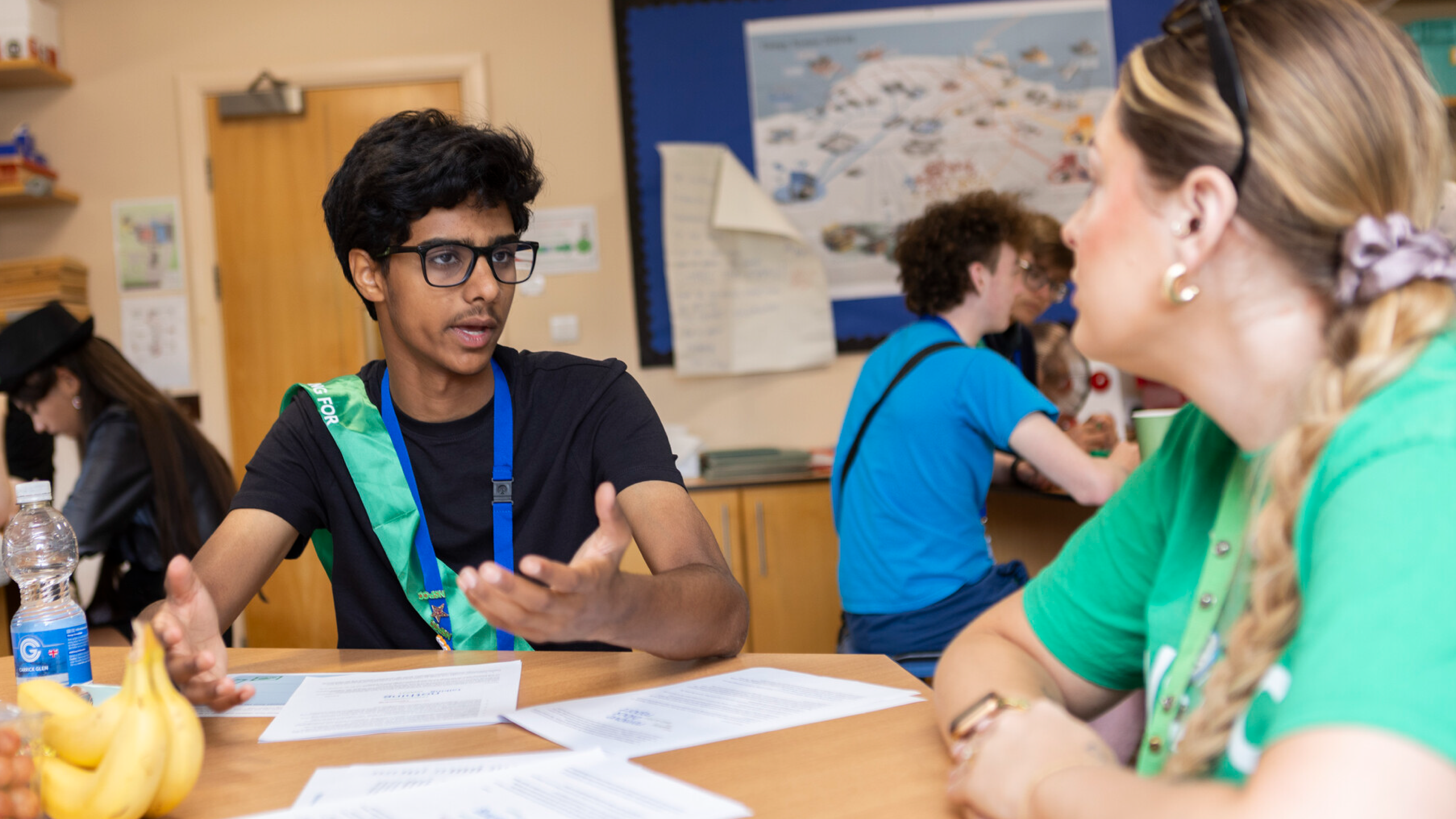 A teenage boy, in conversation